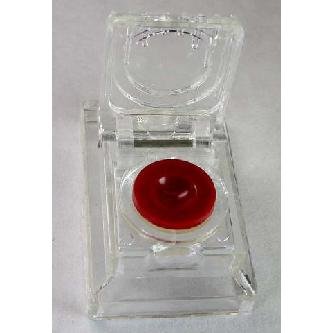 Plastic Oil Cup with lid. Image